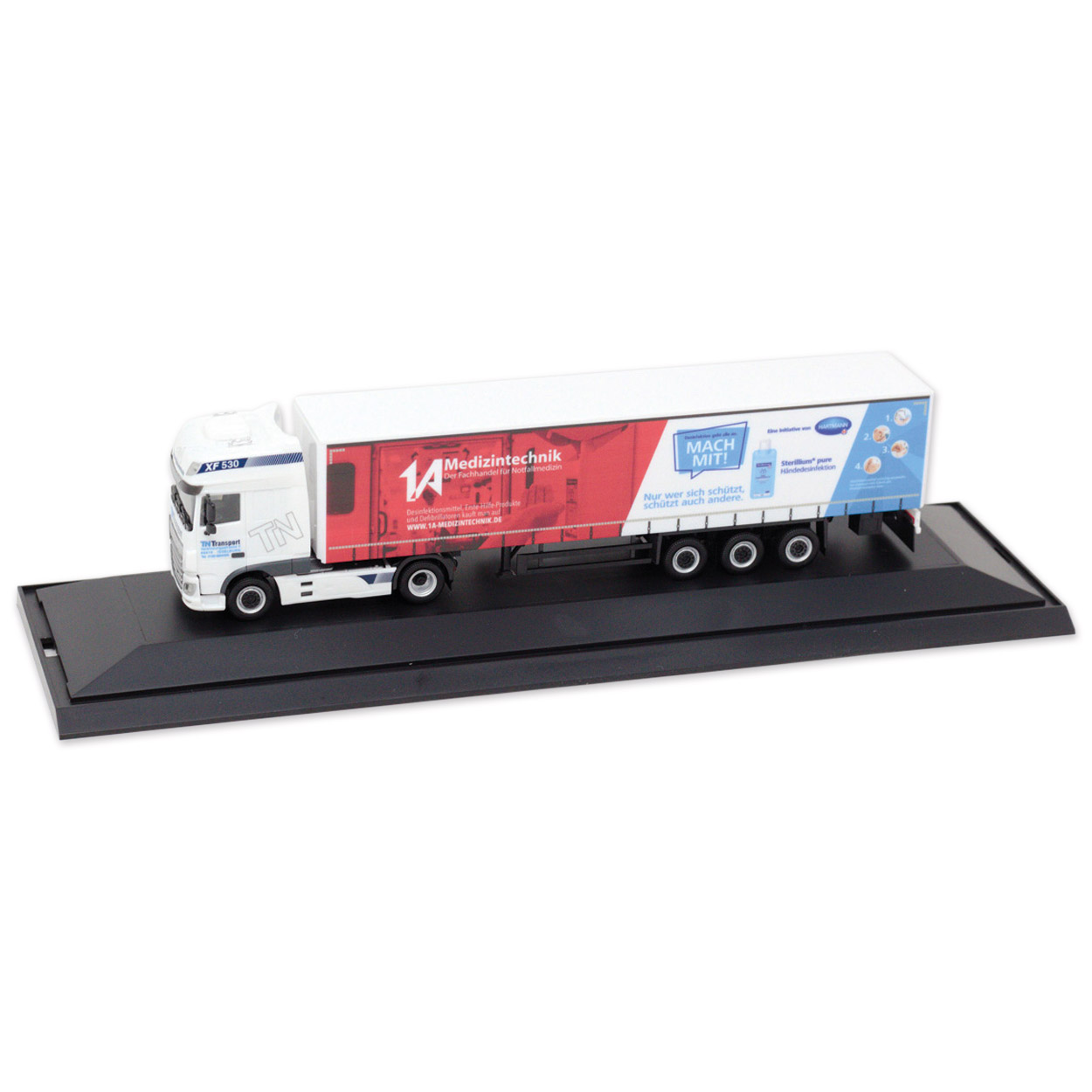 Herpa 1A Modelltruck inkl. PC-Vitrine
