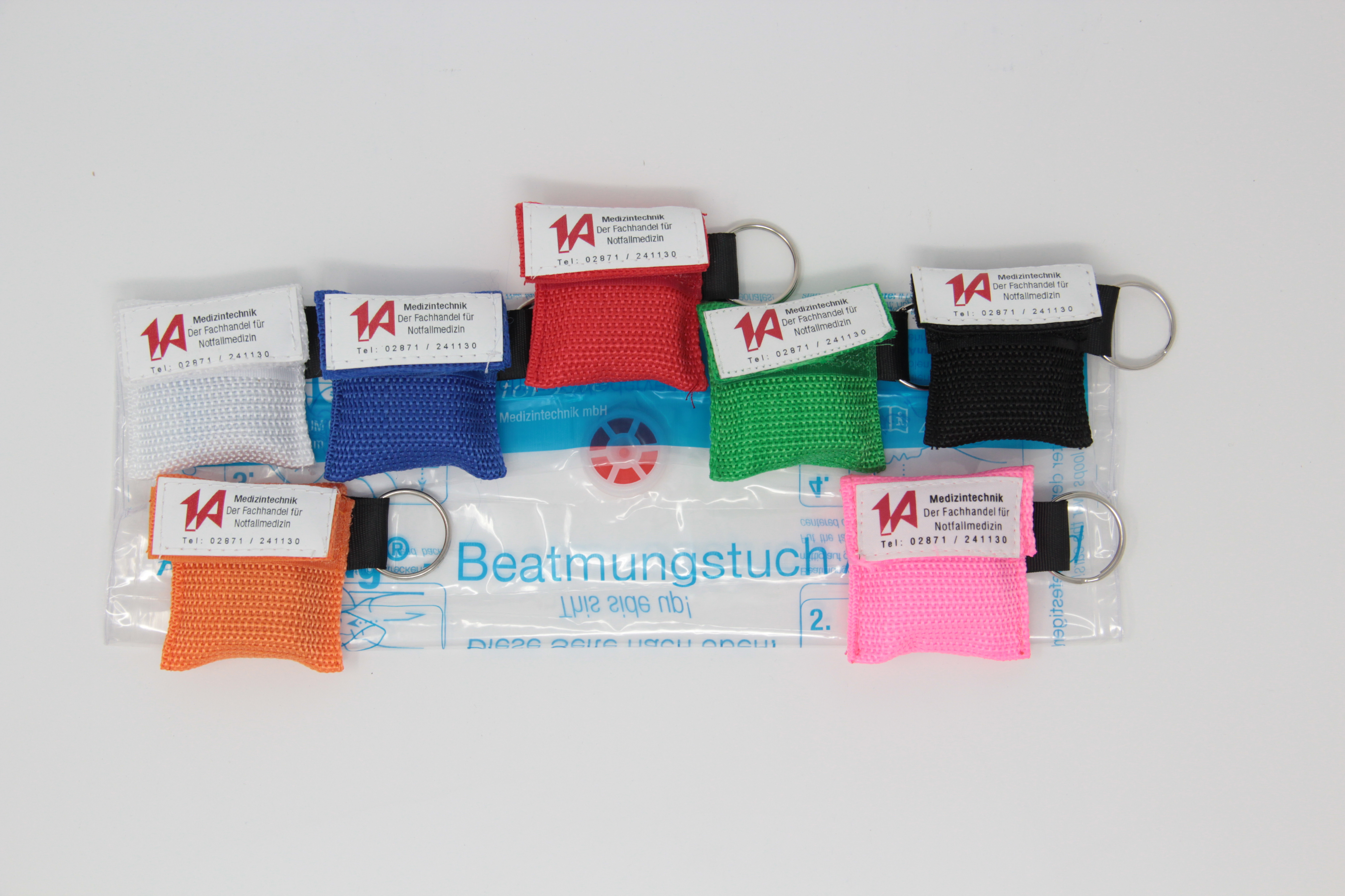 Beatmungstuch im Schlüsselanhänger in rosa - 1A-Logo